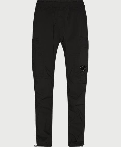  Regular fit | Trousers | Black