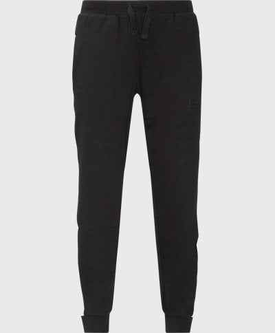  Regular fit | Trousers | Black